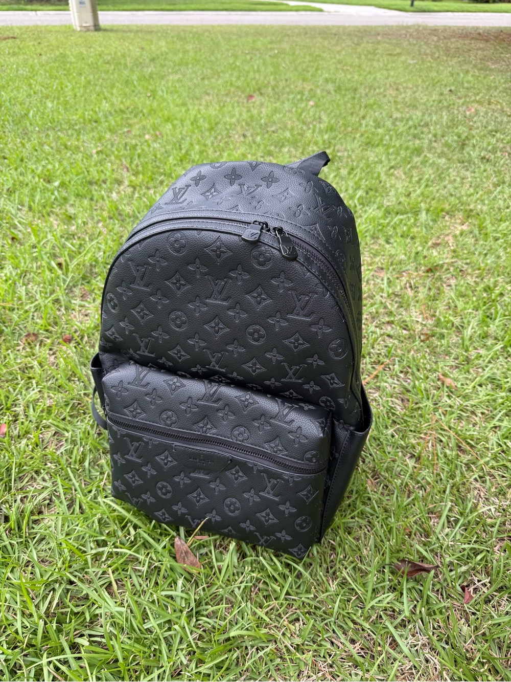 Black Monogram Embossed Leather Backpack
